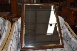 A modern large mahogany effect frame wall mirror, appros 112 x 50cm