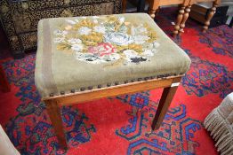 A 19th Century dressing table stool having tapestry top