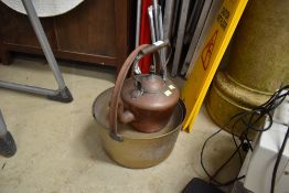 A brass jam pan and copper kettle