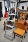 A set of aluminium step ladders
