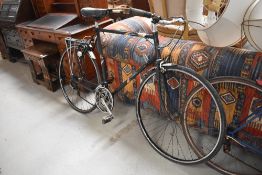 A traditional bicycle , labelled Sun Solo