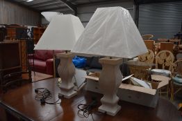A pair of modern oversized table lamps (one having crack to one side)