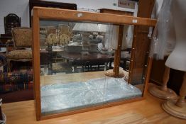 A late C20th golden oak frame shop haberdashery sliding glass door display, approx w 80cm