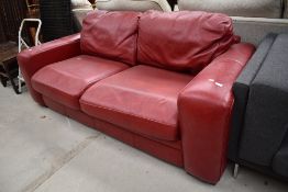 A modern settee , very clean oxblood leather, width approx. 220cm, depth approx. 110cm