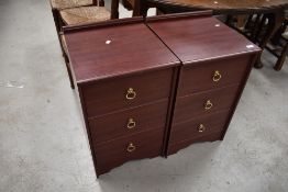 A pair of laminate bedside drawers, rosewood effect