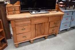 A stripped 19th Century ledge back sideboard, width approx. 153cm