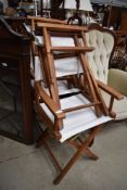 A set of four folding canvas 'directors' style chairs