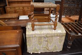 A vintage dome top trunk of small proportions (width approx.49cm) and a strung top stool