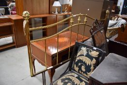 A reproduction brass double headboard