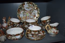 A collection of oriental cups and saucers,sugar basin and plates.AF