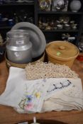 A small vintage aluminium milk churn/billy can,awooden riddle and a selection of vintage table linen