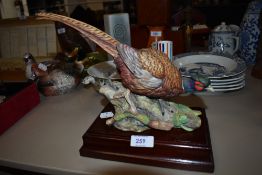 A ceramic figure of a pheasant by Coalport limited run no. 124 of 750