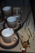 Six Hornsea pottery Coral cups and saucers, a vintage parasol and similar umbrella.
