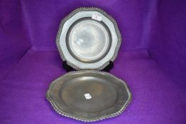 A pair of matching pewter plates having worn mark and angel stamp to reverse