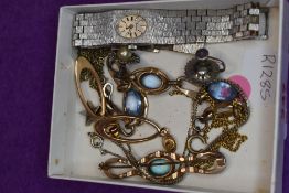 A small selection of costume jewllery including screw back earrings, gold plated loop style stud