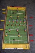 A retro table top football game.
