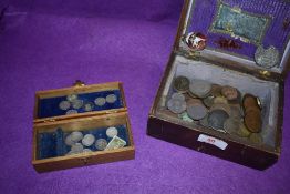 A selection of collectable coins and currency including three pence