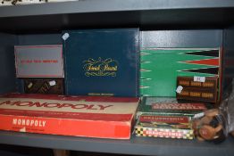 A selection of childrens board and card games including Monopoly and Trivial Presuit