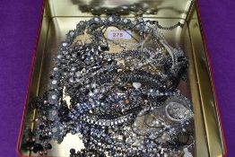 A selection of costume jewellery necklaces of various forms including seed pearls, diamante etc