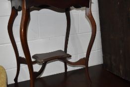 A mahogany hall way wash stand having curved frame work and shelf