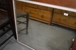 A vintage painted frame over mantel mirror