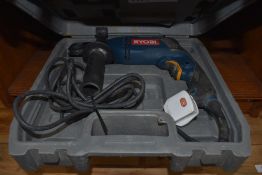 A corded Ryobi hammer drill