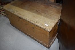 A stripped pine bedding box
