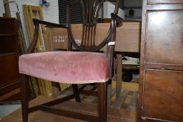 An antique mahogany framed carver chair