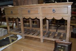 An American oak dresser base, possibly Ethan Allen, distressed finish