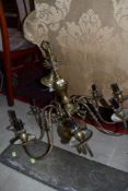 A vintage brass electric ceiling light, eight branch