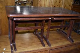 A mahogany effect coffee table nest