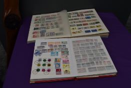 Two Stock Books of Commonwealth Stamps, George V to Queen Elizabeth II, most countries seen,