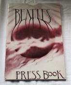 A copy of the hard to find official Apple Records Beatles press book ' the Apple office present '
