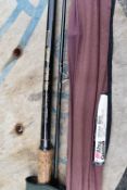 An ABU Garcia Conolon 1000 and a Daiwa sensor loft rod in sleeves.