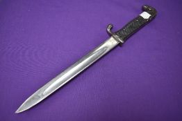 A German Model 1898 Dress Bayonet with two rivet chequered grip, maker mark Weyersberg