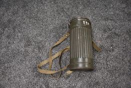 A German WW2 Gas Mask in metal canister