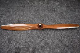 A early 20th century wooden Aeroplane Propellor with metal mounts on leading edge, length 160cm