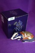 A ceramic Royal Crown Derby paper weight or figure of a Moonlight Badger having Gold stopper and