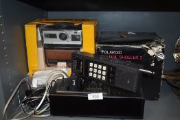 Two instant Polaroid cameras including Kodak EK100 and Polaroid Square shooter 2 in box