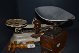 A selection of kitchen wares including coffee grinder and balance scale set