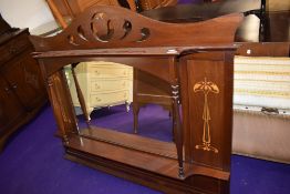 An Edwardian mahogany over mantel mirror, having Art Nouveau style inlay decoration
