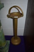A brass smokers stand