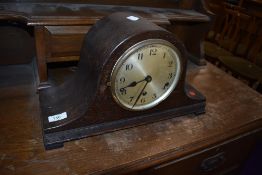 An early 20th Century oak cased mantel clock