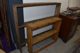Two rustic pine wall shelves
