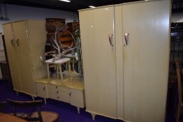 A vintage three piece bedroom suite