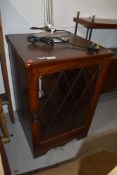 A priory style part oak glazed hifi or similar cabinet