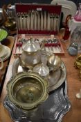 A variety of flat ware and a vintage canteen of cutlery.