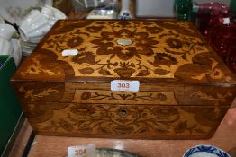 An antique writers compendium or lockable case having extensive Arts and Crafts style veneer inlay