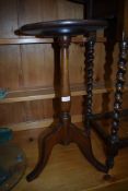 An early 20th Century wine table, height approx. 59cm