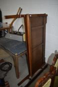 An Edwardian oak framed bed with irons